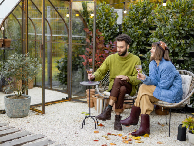 Couple enjoying their greenhouse