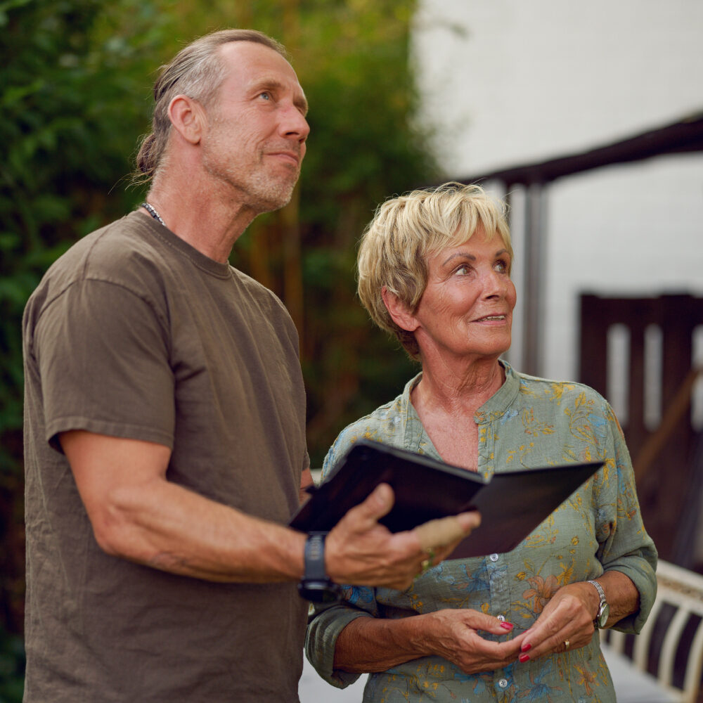 Shed designer talking to client