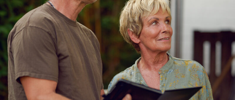 Shed designer talking to client